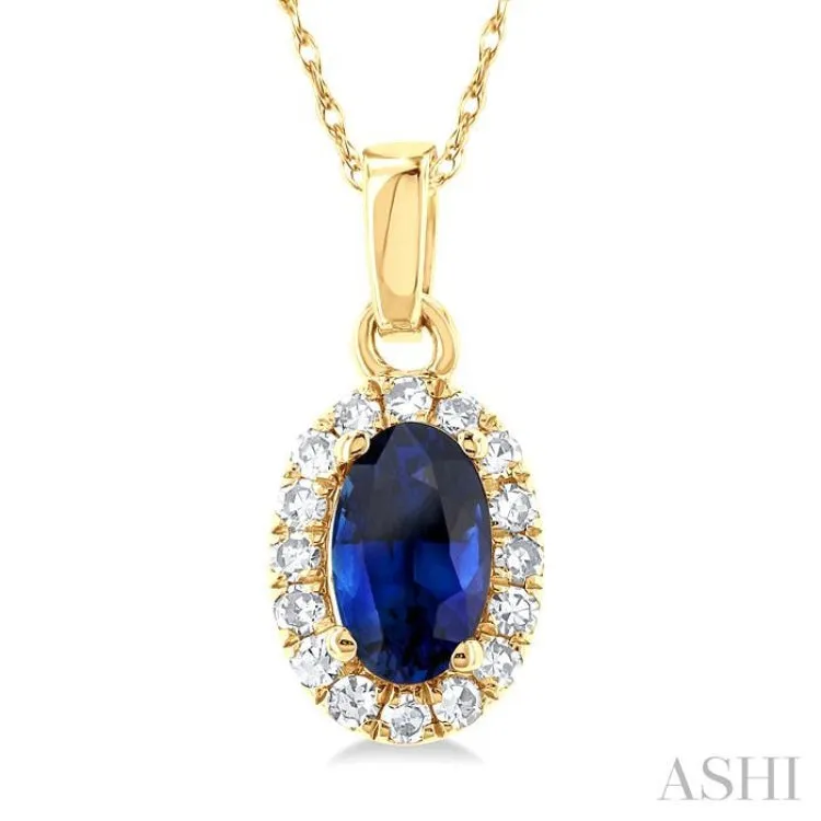 1/20 ctw Round Cut Diamond and 5X3MM Oval Shape Sapphire Halo Precious Pendant with Chain in 10K Yellow Gold
