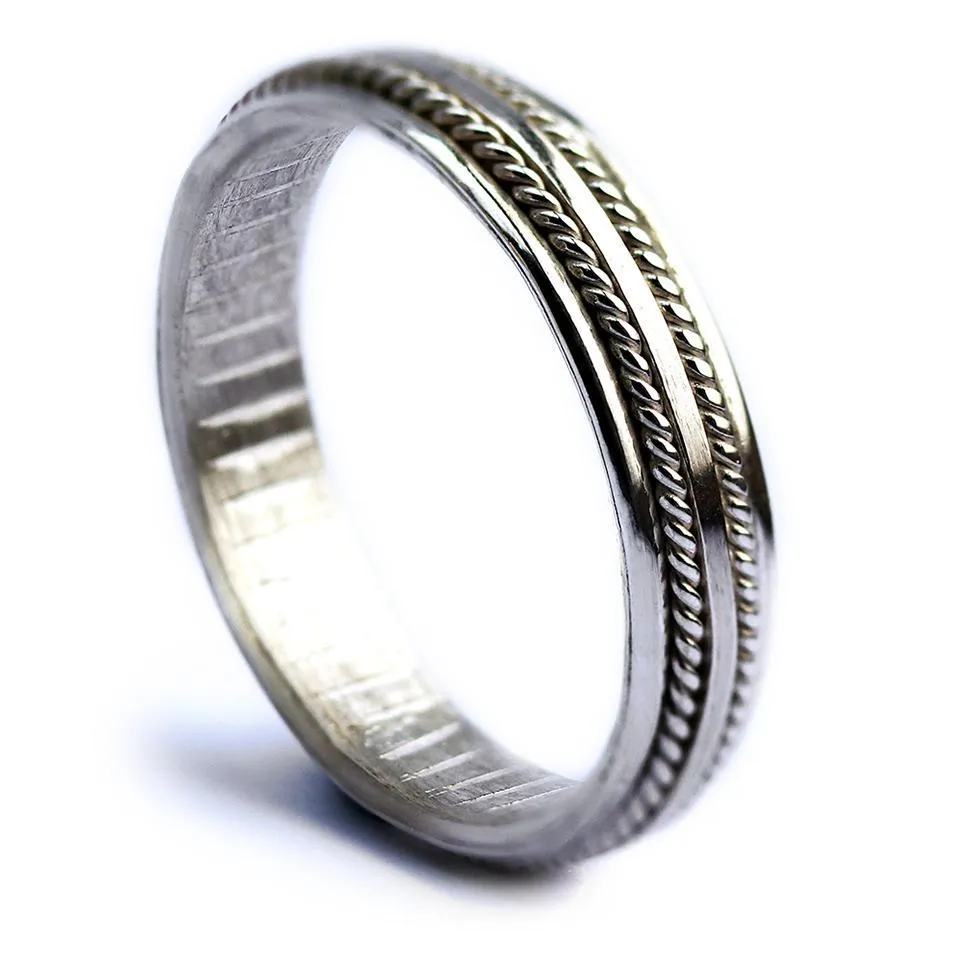 Double twist- commitment rings