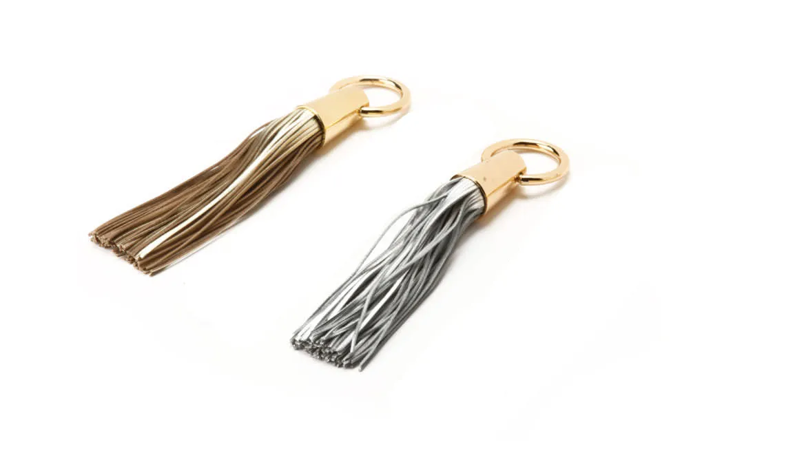 Gold Leather Tassel Napkin Rings by Julian Mejia