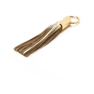 Gold Leather Tassel Napkin Rings by Julian Mejia