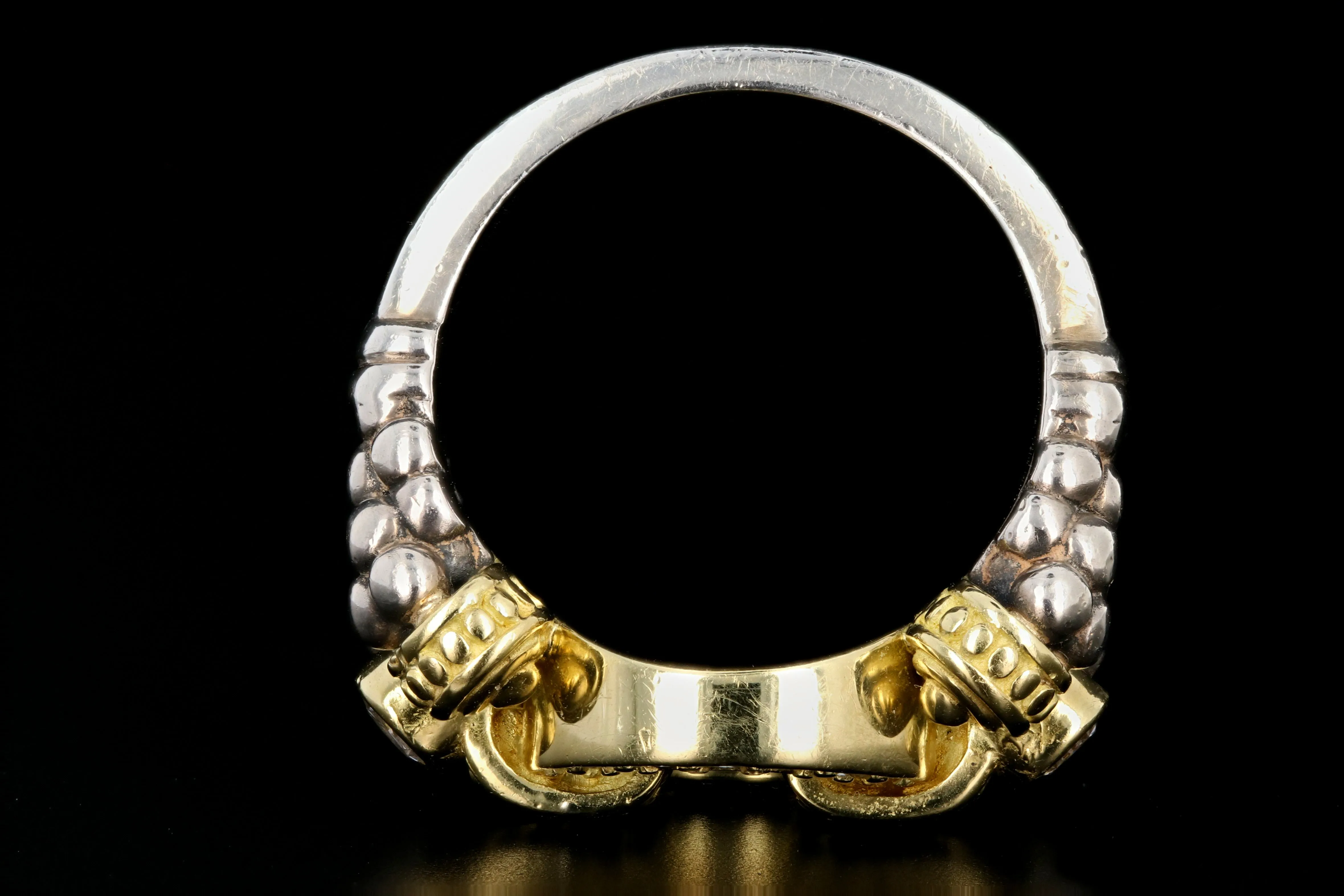 Modern Lagos 18K Yellow Gold and Sterling Silver .48 Carat Round Brilliant Cut Diamond Caviar Circle Game Ring