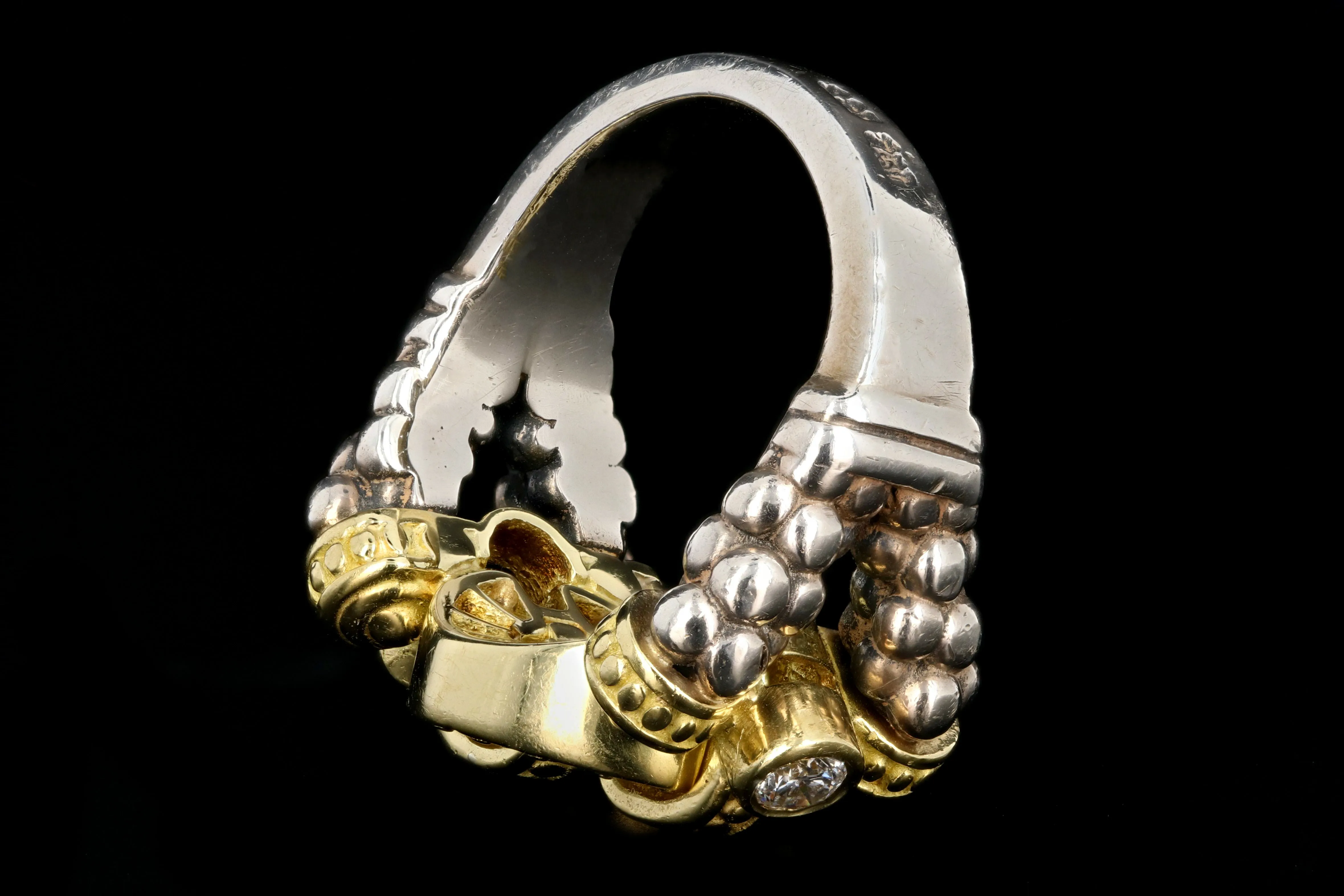 Modern Lagos 18K Yellow Gold and Sterling Silver .48 Carat Round Brilliant Cut Diamond Caviar Circle Game Ring
