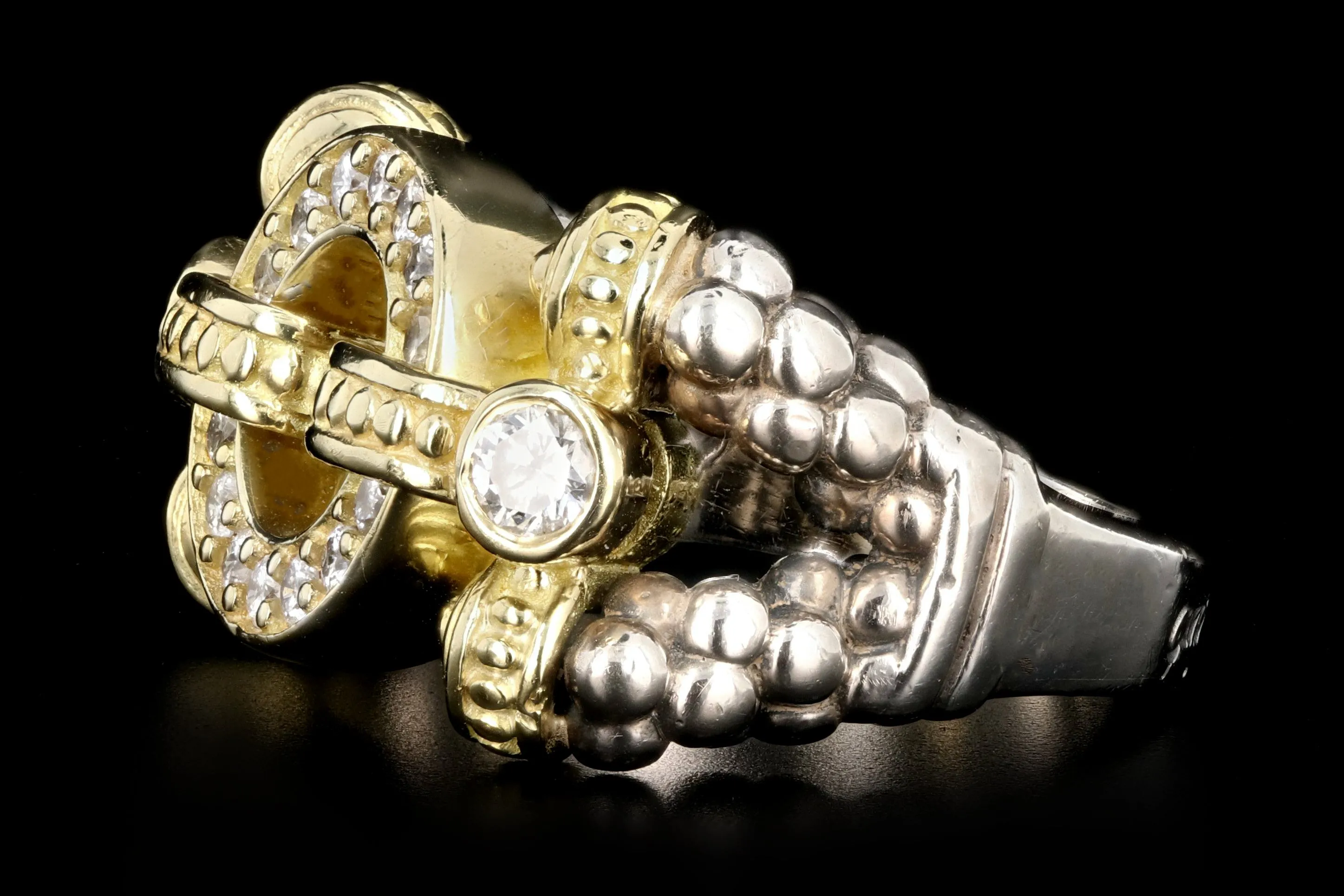 Modern Lagos 18K Yellow Gold and Sterling Silver .48 Carat Round Brilliant Cut Diamond Caviar Circle Game Ring