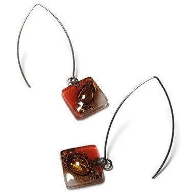 Open oval wire with handmade in red, soft lavender and brown recycled glass beads.