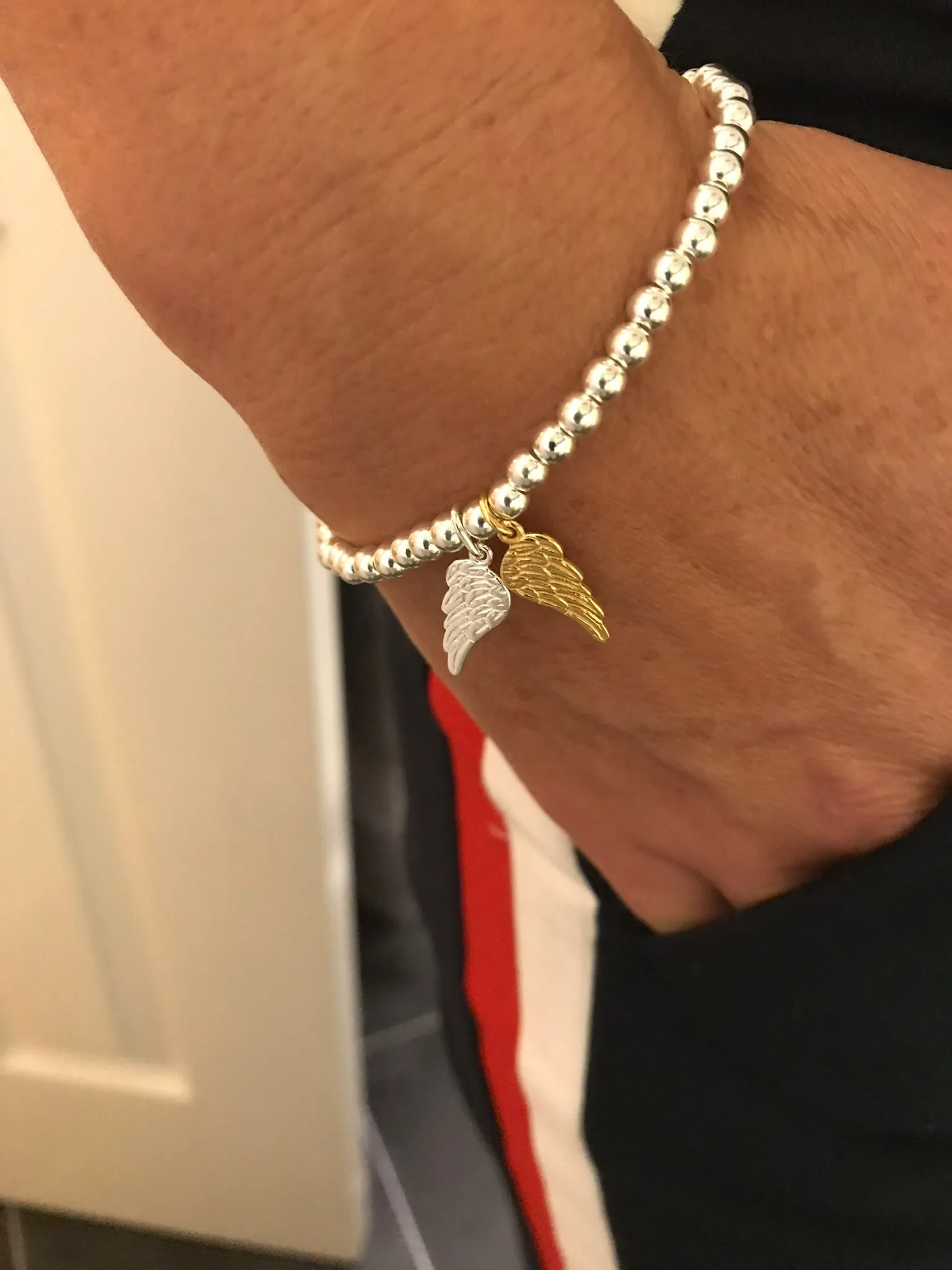 Silver and Gold Angel Wing Bracelet