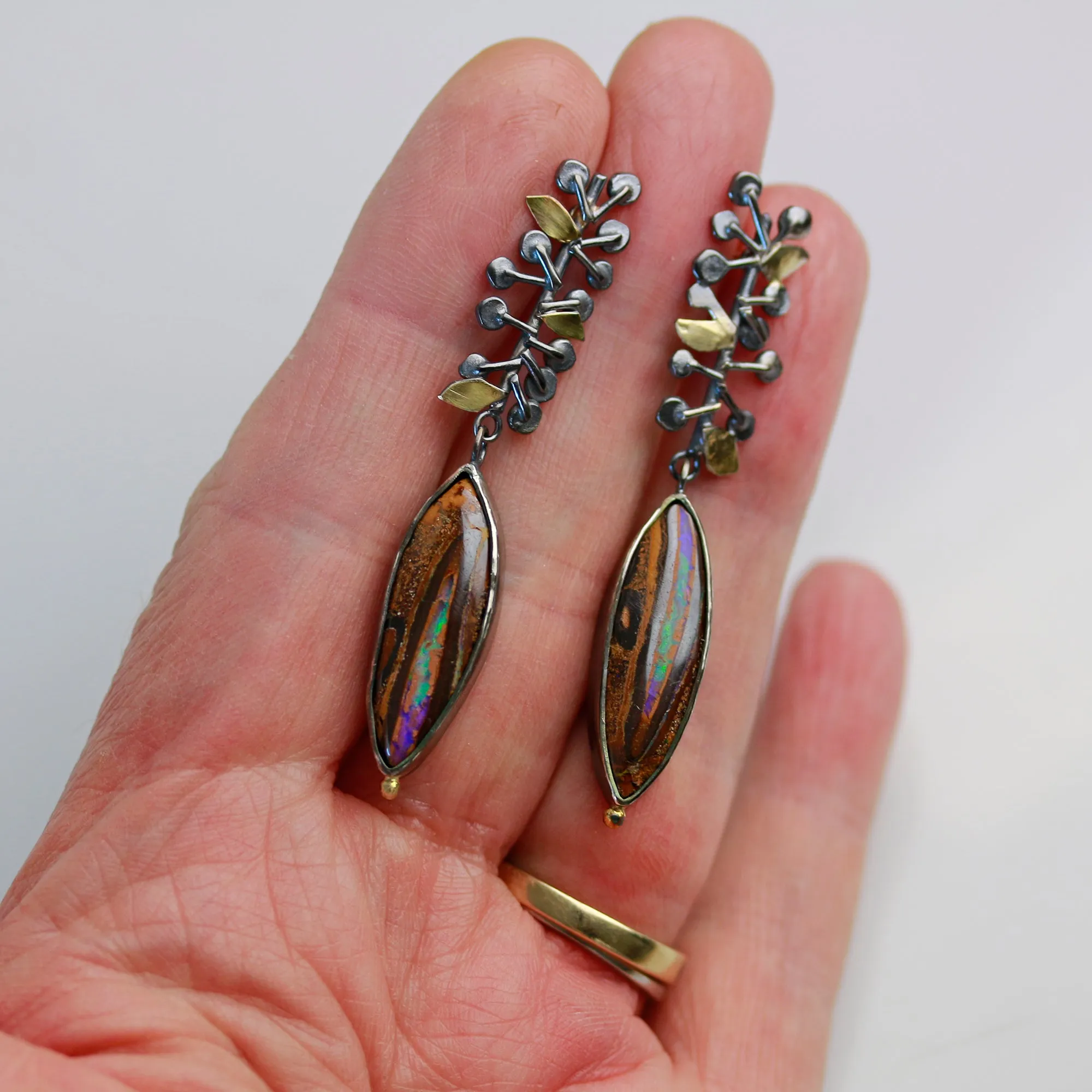SOLD  Vine Topped Boulder Opal Earrings