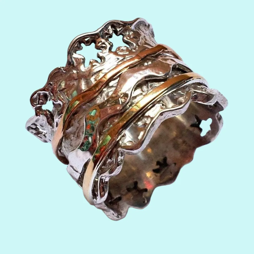 Spinning ring silver 9 ct gold. Floral spinner meditation ring.