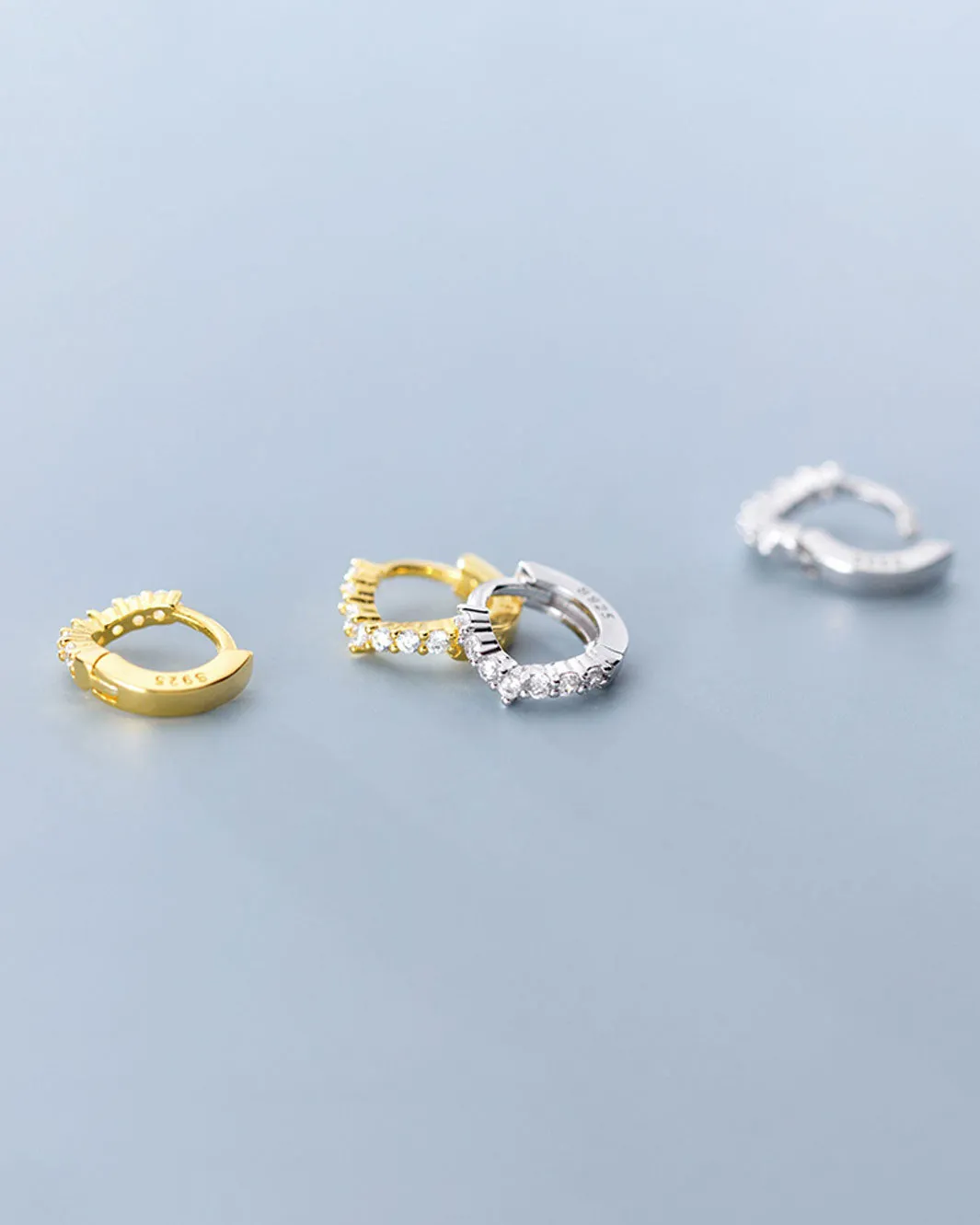 Tiny V-shaped Huggie Earrings